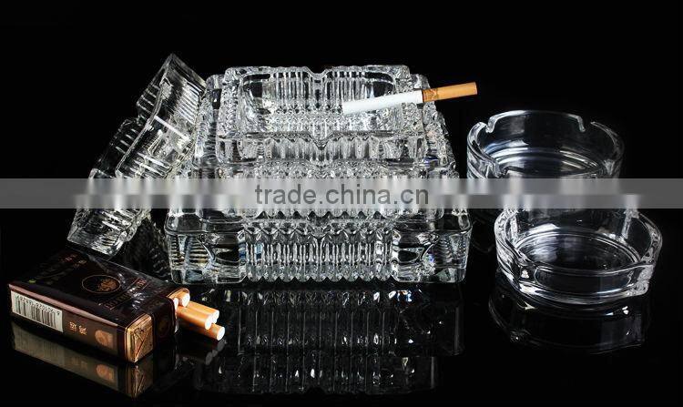 clear glass ashtray with different size square and round shape