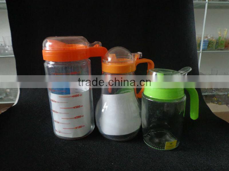 clear glass oil bottle