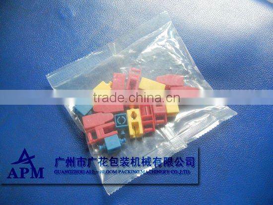 Mixed products filling and sealing packaging machine system