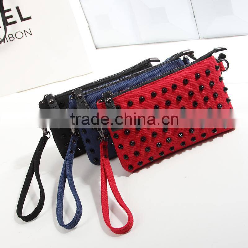 2016 Europea style factory directing selling high quality women blue clutch bag with rivet
