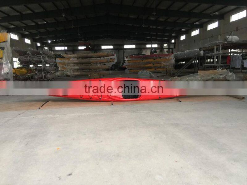 single plastic kayak with pedals / sea kayak / kayak paddle