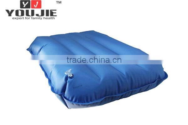 Blue inflatable leg support cushion