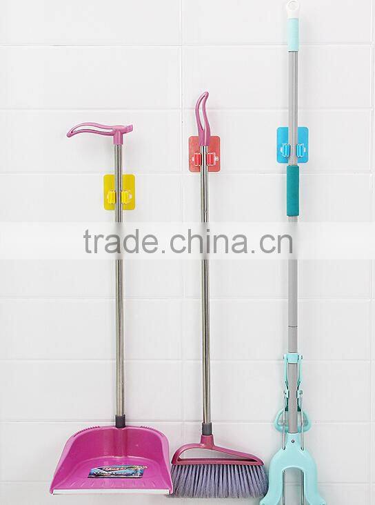 Wholesale Stock Magic Wall Suction Plastic Mop Handle Storage Holder