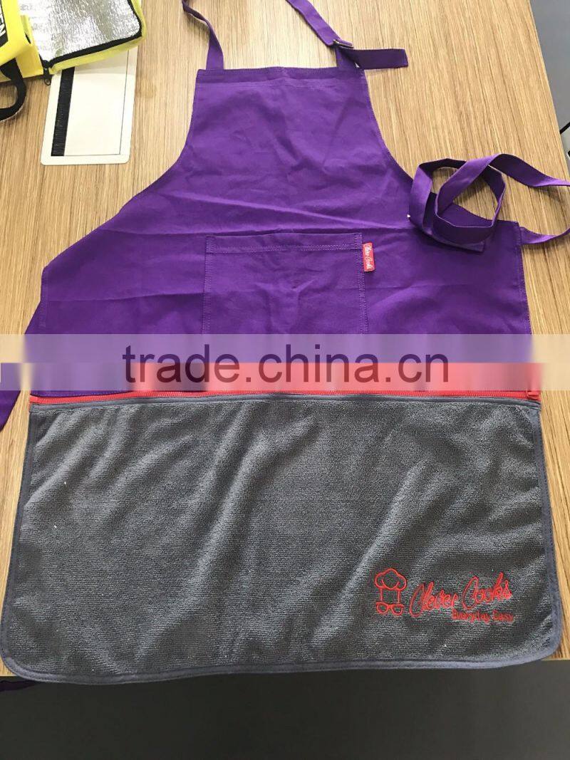 purple embroidered apron with towels