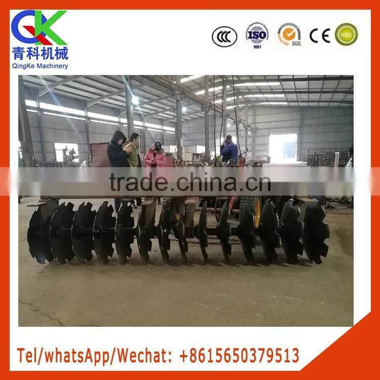 Hydraulic traction heavy harrow with hydraulic lifting tyres