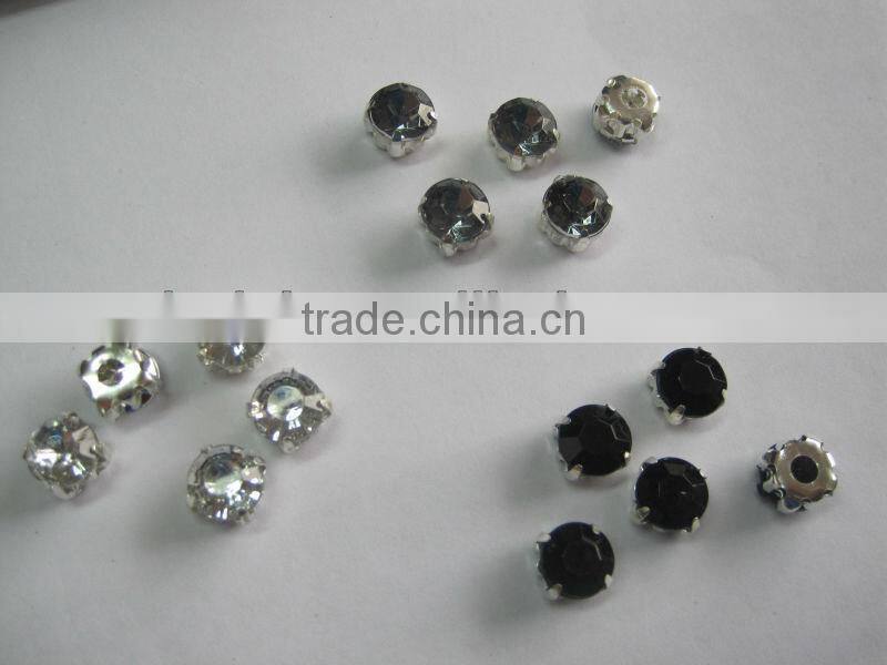 rhinestones in silver claw setting with two prongs