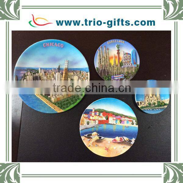 Resin wall plaque with boat and seaside village design