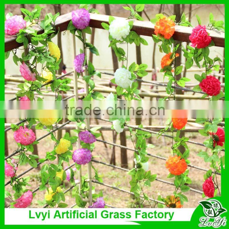 Artificial green leaf vine with flowers for decoration