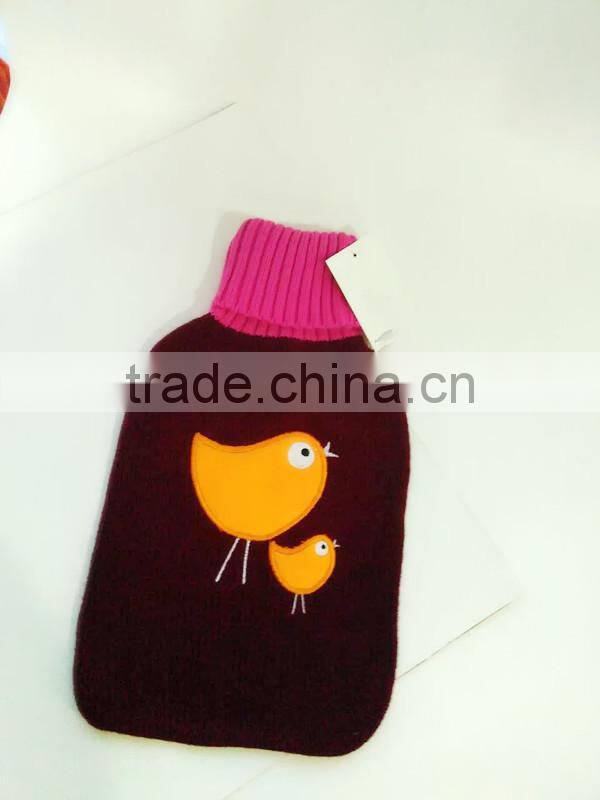 hot water bottle cover knitted with yellow bird