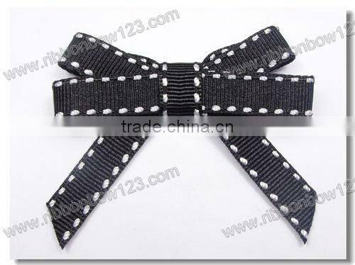 Pink logo ribbon bow with lable for gift