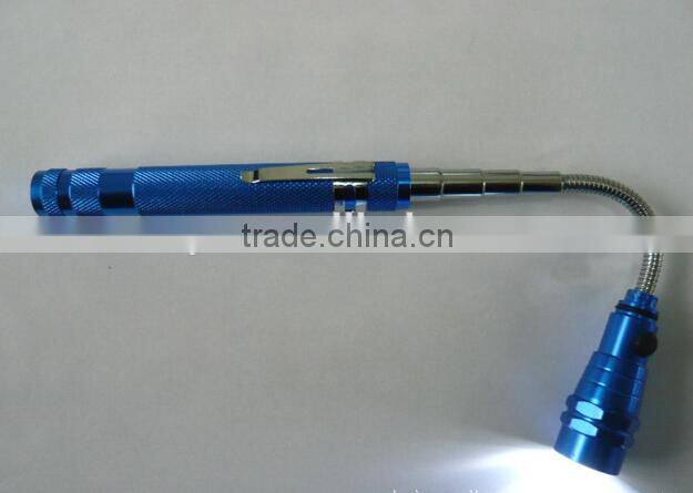 LED flashlight with telescopic magnetic pick-up tool