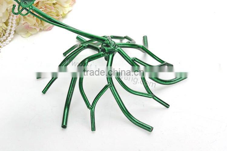 Metal display stand for jewelry with a birdcage for earrings