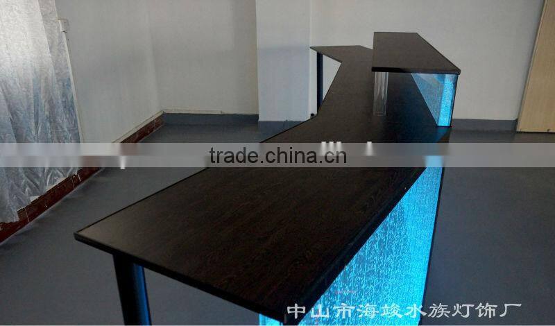 fatastic hotel frond desk receiption with led lights and water bubble moving.