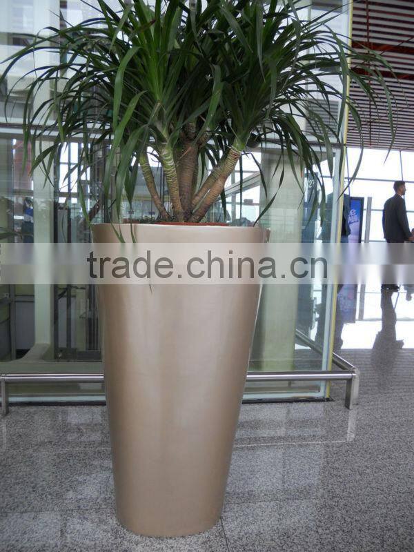 Gold fiberglass planter