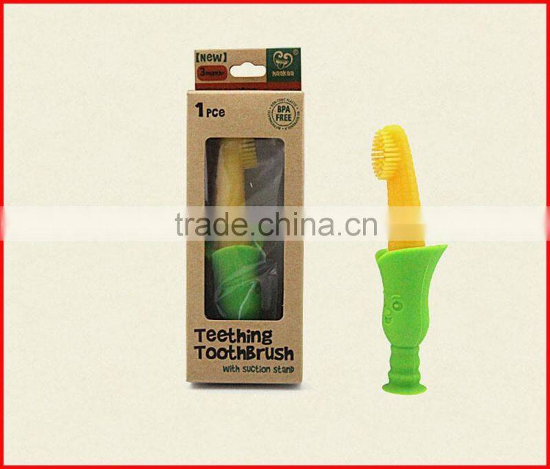 Baby's teething toothbrush with suction stand
