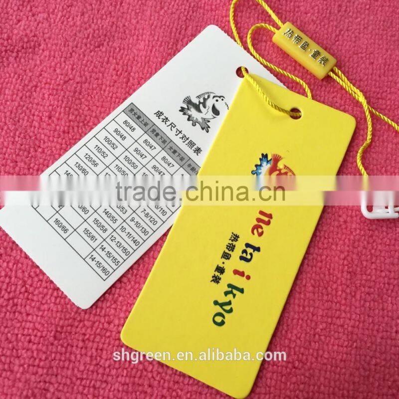 Glossy hole punched paper swing tags