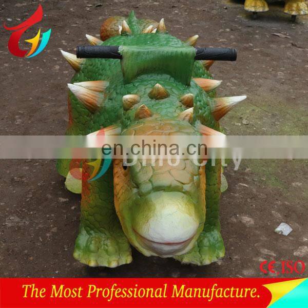 Amusement park kiddy riding walking dinosaur