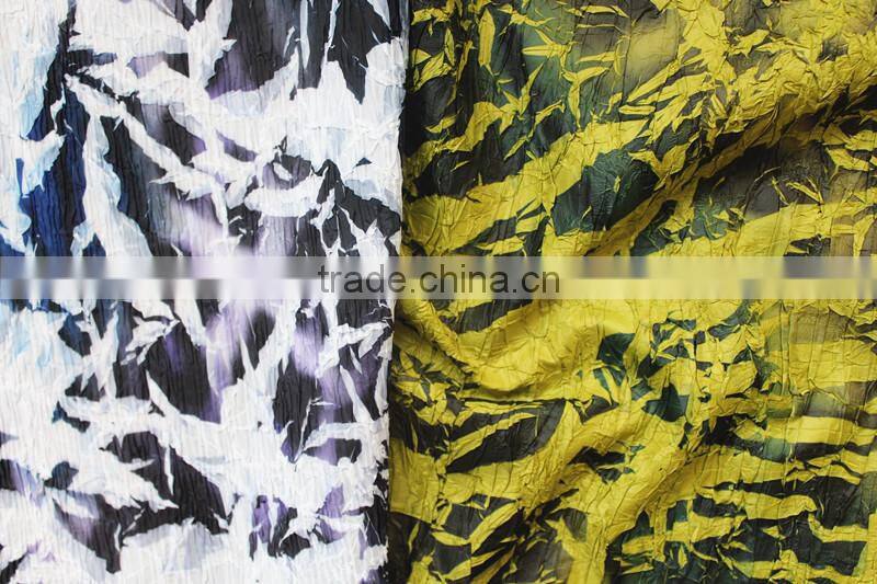 Do the old effect leaves pleated and printed polyester fabric in special style of garment fabric