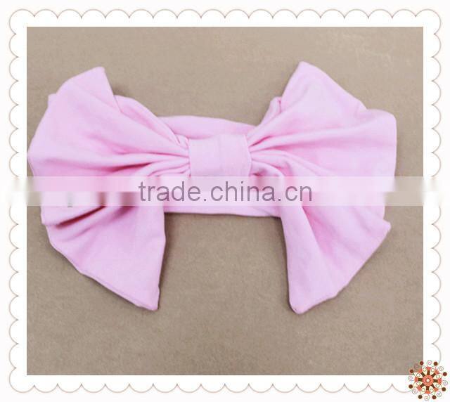 Wholesale Lovely Pom Pom Headband In Plain Pale Pink