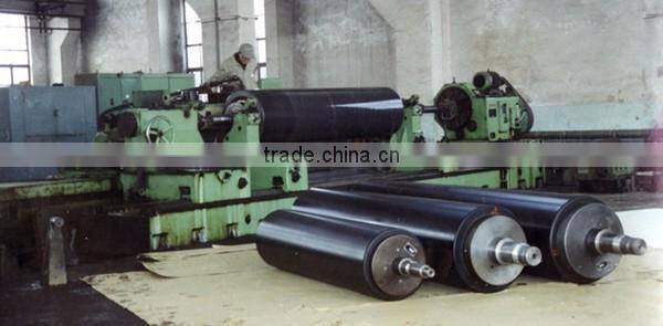 Artificial stone roll for paper machine