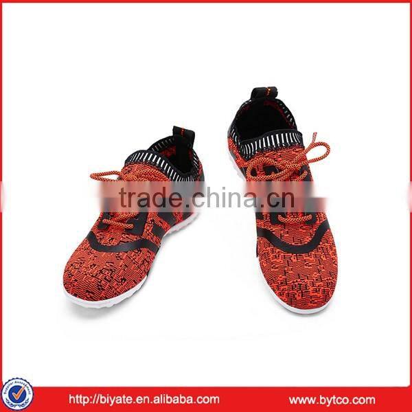 2016 hot sell breathable flyknit spike soccer shoes