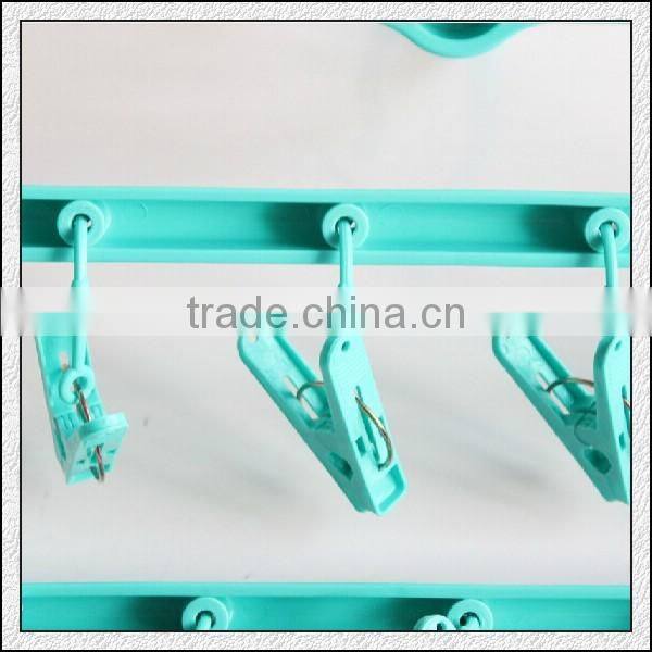 Cheap hot sell high quality plastic foldable hanger for cloth baby size with lips factory