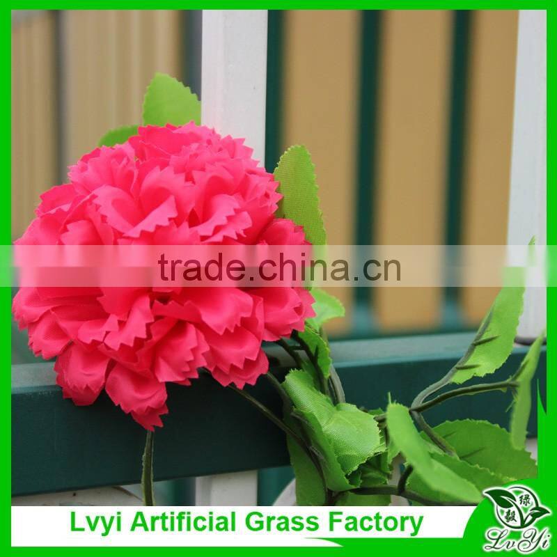 Artificial green leaf vine with flowers for decoration