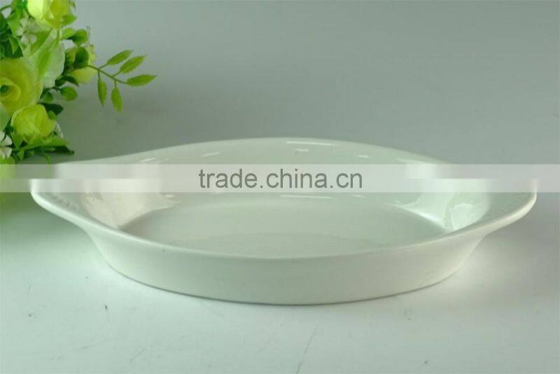 White oval shape ceramic bakeware porcelain bake plate with hands in stocklots