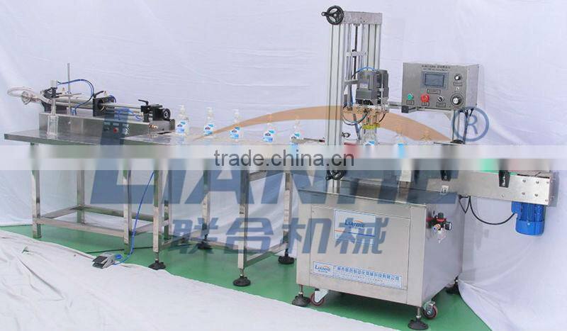 Liquid filling machine with a hopper/Liquid filling machine. water filling machine, oil filling machine