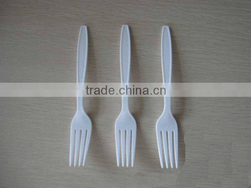 single-use polystyrene printed plastic cutlery (forks packet)