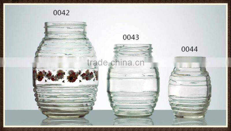 Honeycomb shape glass honey jar with tap for wholesale online