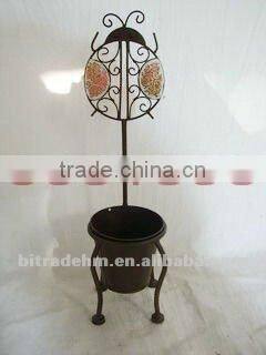 tiny chair with metal flower pot