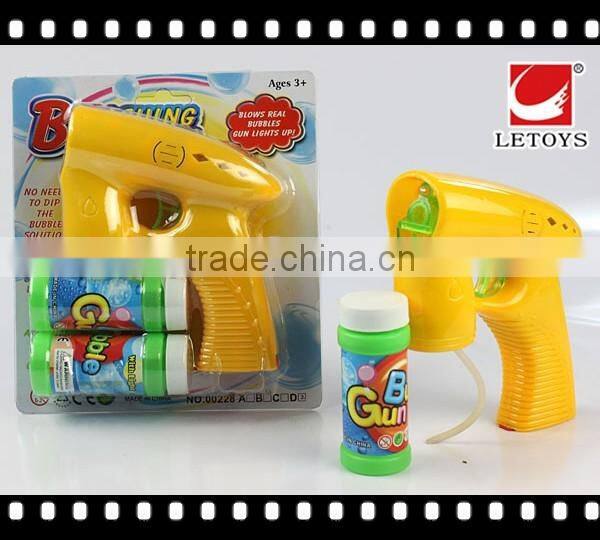 wholesale musical LED light solid color bubble gun with 2 bottles bubble water