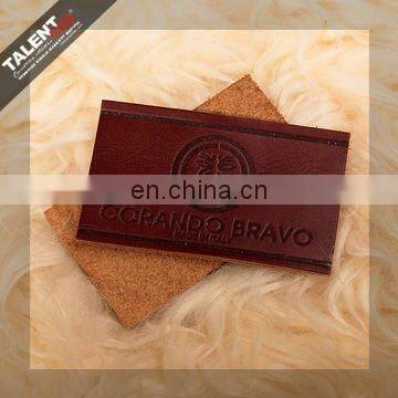 high quality customized private brand name logo jeans genuine leather patch in garment