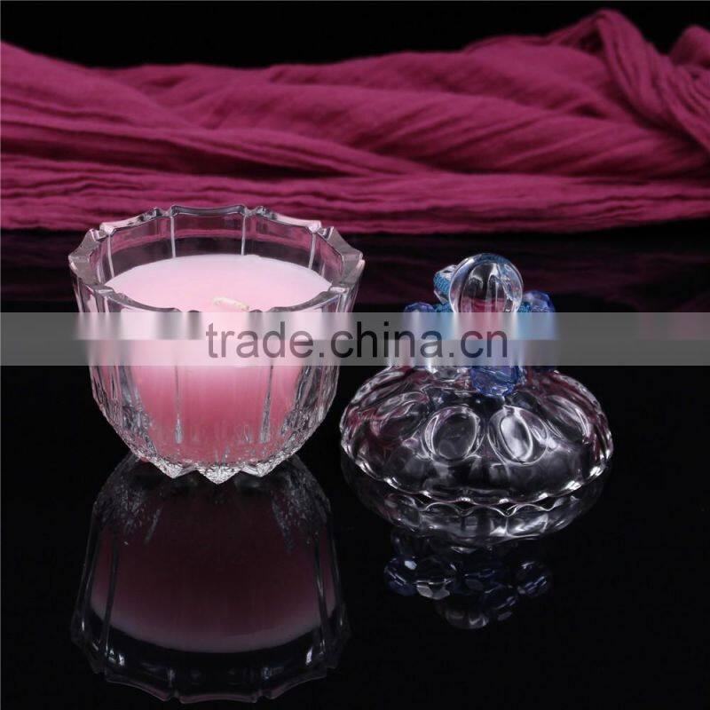 christmas colorful soy or paraffin wax scented candles in glass jars
