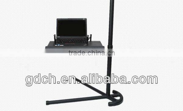 Portable folding notebook desk stand with mouse pad in bed