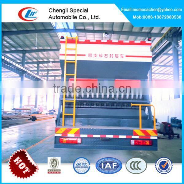 10000L asphalt tank 16cbm gravel bucket synchronous chip sealer,construction stone chips with Howo chassis