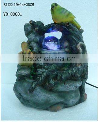 fountain with two goldfish