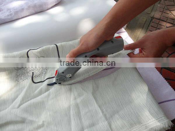 tailor cloths scissors