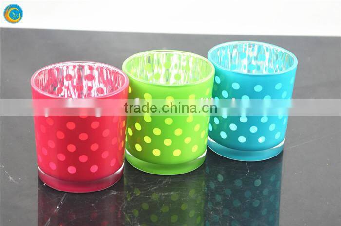 orange dotted glass candle holder