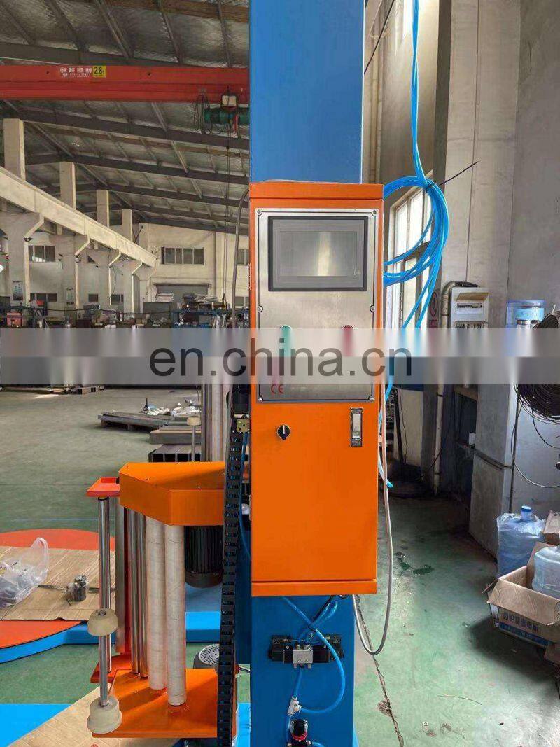 Manufacturer of Brick and cement pallet stretch wrap machine and stretch wrapper