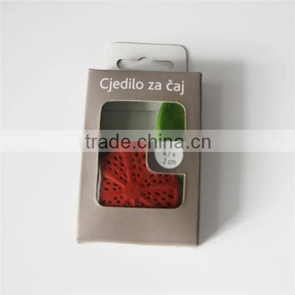 Small stainless steel teapot shaped strainer