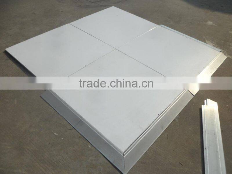 Natural teak wooden dance floor with gold anodized aluminum trim