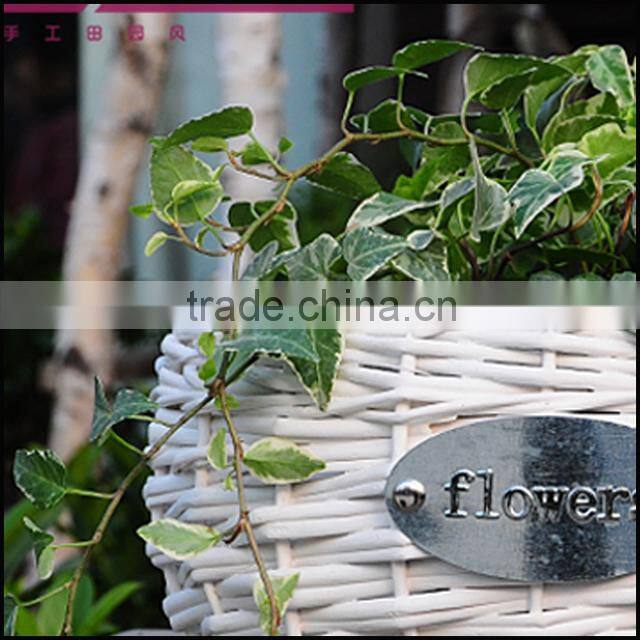 round cheap with metal logo white flower wicker basket