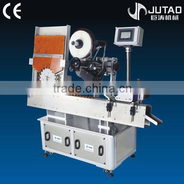 Table labeling tube labeling machine