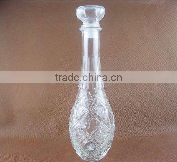 Glassware, glass wine bottle with lid