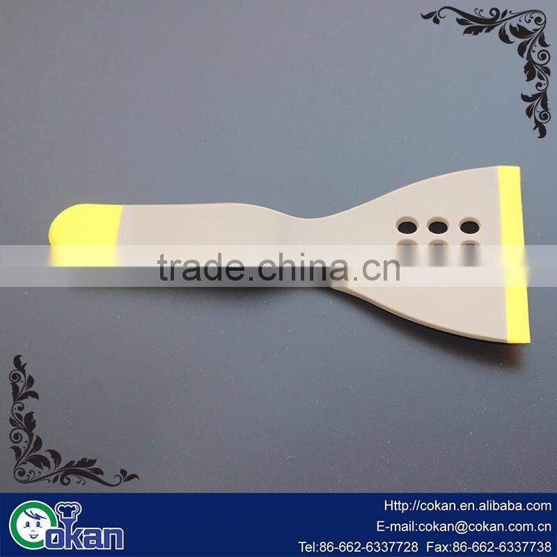 COKAN Nylon slotted turner covered TPR Multi