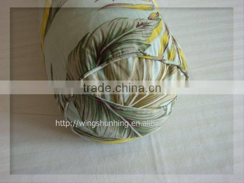 Comfortable travel cylinder pillow with handle bet