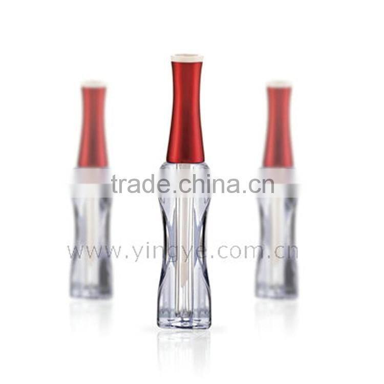 Slim gold plastic roll on lipgloss bottle