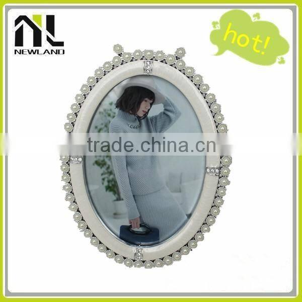 Cheap oval wholesale photo frames picture of baby